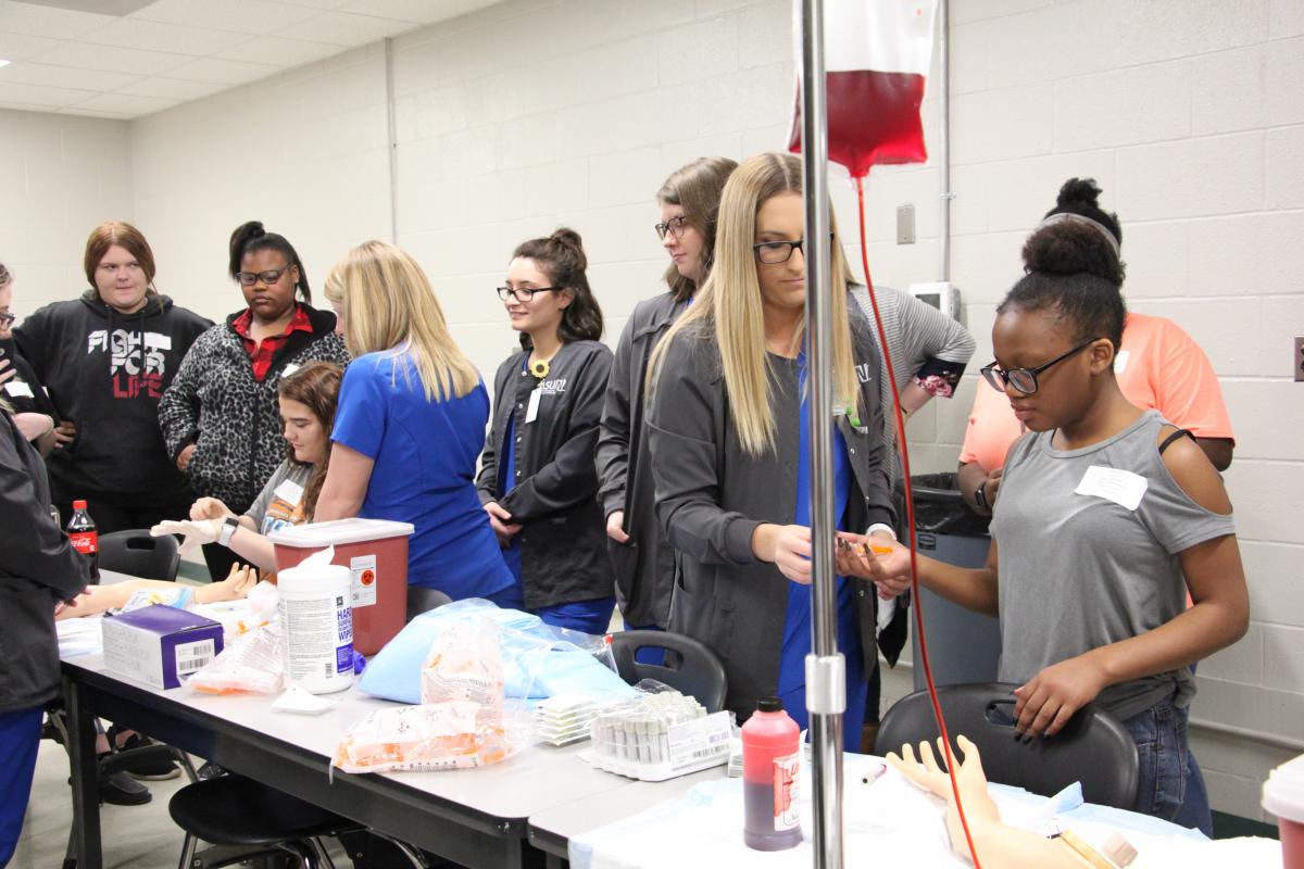 Students working in the phlebotomy lab.