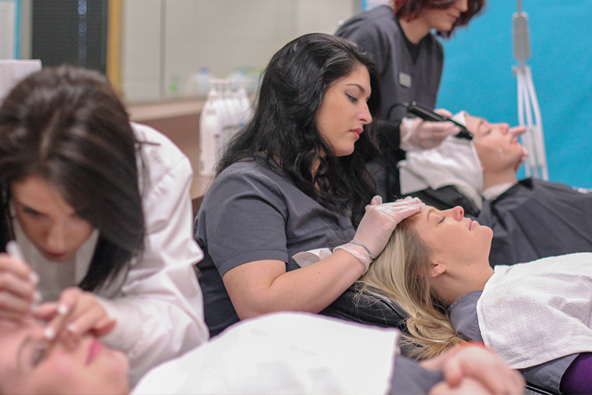 Cosmetology Students doing facial work