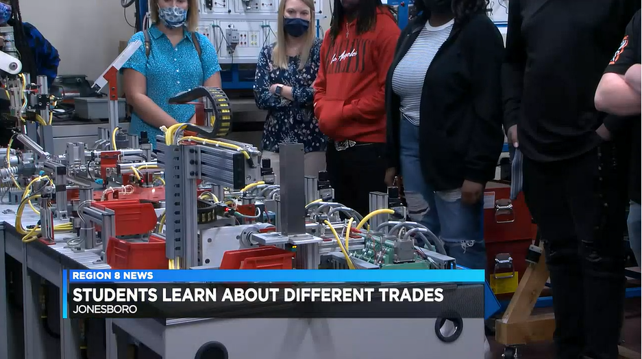 Image of counselors and students learning about Industrial Maintenance